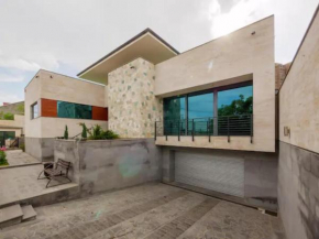 Luxurious villa with a pool near city center